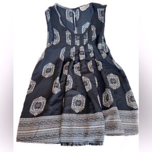 Siena Sky Women’s Sleeveless Black Blouse with Medallions Size Small.